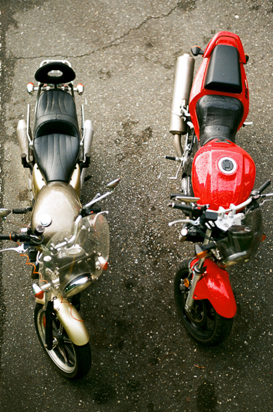 an overhead view of two parked motorcycles