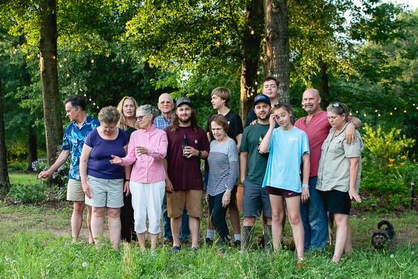 group photo in front of trees