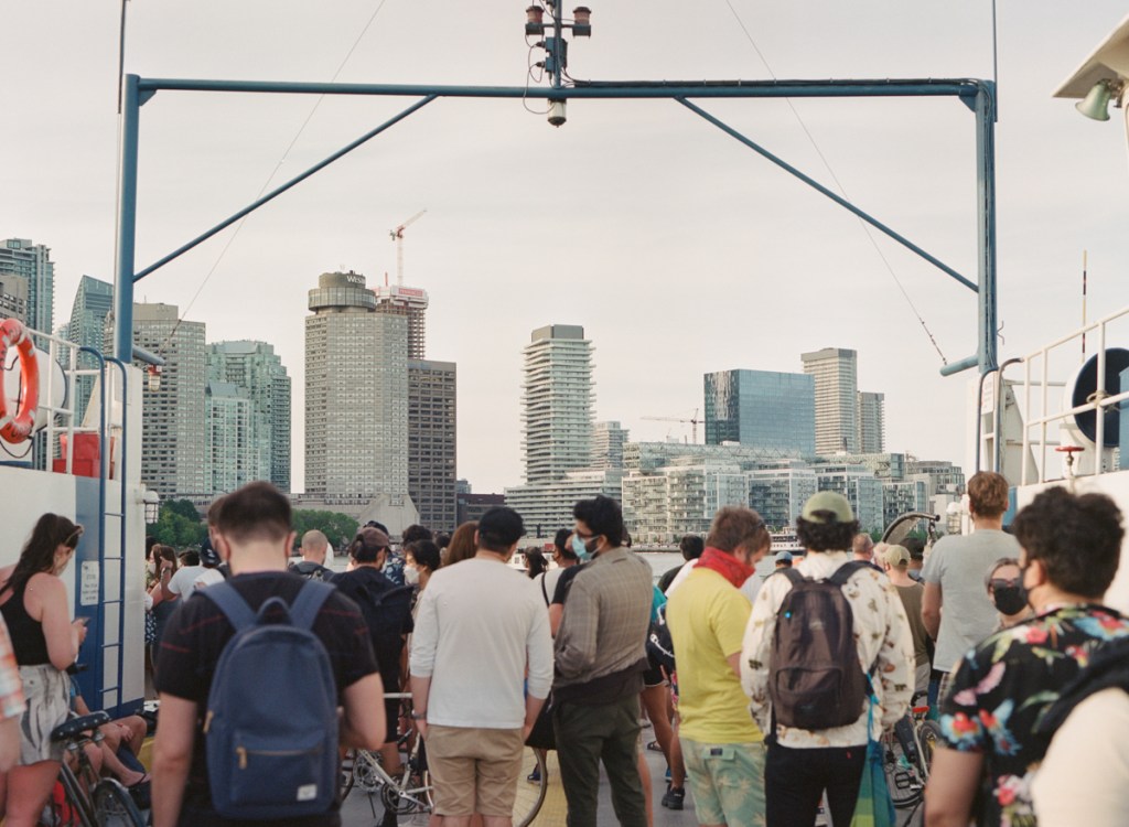 An image of the Toronto skyline taken from a ferry on Lake Ontario.