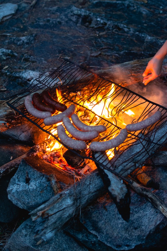 image of sausages grilling