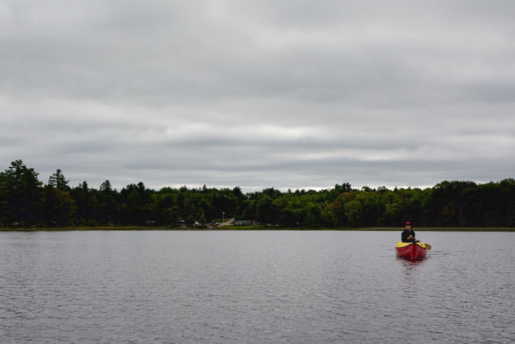 image of a canoe on a lake