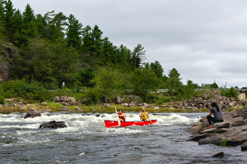 image of a canoe in whitewater