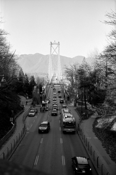 black and white photograph o the lions gate bridge