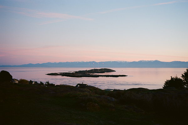 a sunset over a harbor in victoria BC
