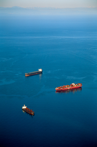 an image of barges on the ocean