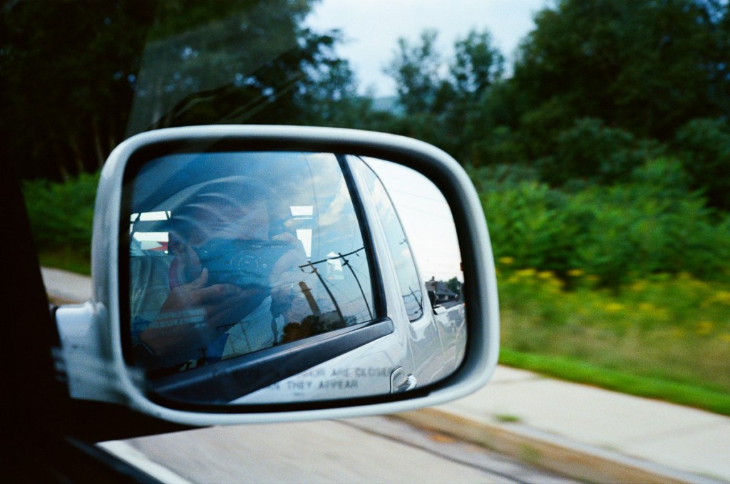 a photo of a car's rearview mirror